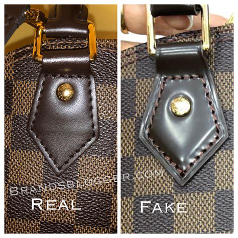 how to spot a fake alma louis vuitton bag|louis vuitton alma tote bag.